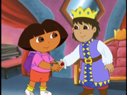 "¡Gracias! Thanks!" Dora thanking the prince for the magic music box