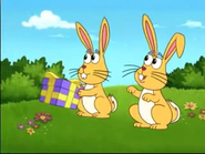 The rabbits have a present for Dora.