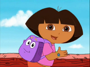 (And now, we can keep saying her name in English after one-time adventure of saying in Spanish!) YOU have to say, "Backpack!"