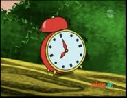 (Alarm clock rings)