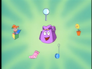 "¡Hola!" greets Backpack. "I have lots of stuff, but Dora and Boots need something that'll make the bugs look bigger!"