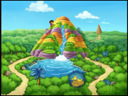 [Our rainbow story begins as Dora and Boots are climbing up Rainbow Rock. (Remember that place from the day of their Best Friends Day picnic?)]