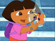 Dora tells him they promise they can get him out.
