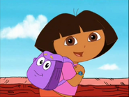 "Hey! I got an idea! If we can make the whale do a really BIG sneeze, he'll sneeze out Swiper! Backpack has something inside that’s making her sneeze!"