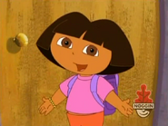 Dora tells the viewer that Papi is baking her a cake for Mama for Mother's Day.