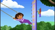 What number did Dora swing to? 4, right! So to get to 7, does she need to go higher or lower? Higher!
