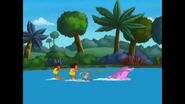 Dora, Boots, and Diego being pulled by the dolphin