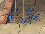 We're the Wiggiling Spiders and we mean you no harm. But we won't let you by 'til you wiggle your arms!