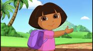 Help Dora find something to play fetch. Say, "Backpack!"