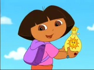 An idea flew into Dora's head. She can put the bag in her backpack for safe keeping.