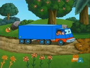 There's Swiper! Rolling down the hill.