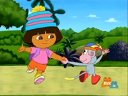 (both laughing) Spin, spin, spin… (And Dora's hat springs along!)