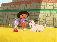 Dora explains to the goat that they need to go through the pyramid.