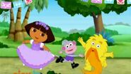 Dora holds her flower dress.