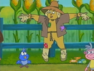 Mr. Scarecrow apologizes for scaring Baby Blue Bird.