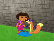 "I think someone's calling you!" said Swiper to Dora.