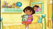 [The episode begins at the bedroom with Dora alone, with a book in her hands while waiting for someone to read it with her.] ¡Hola, Dora!