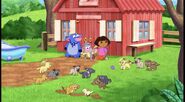 [The episode begins with Dora and Boots at Benny's Barn with Benny, and…look at all those puppies!]