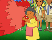 Abuela hugs Big Red Chicken.