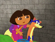 Swiper!" (Dora's right. There has to be a way to get over the wall.)