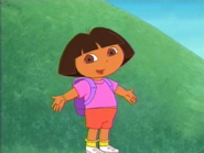 [¡Hola, Dora! The episode starts with her standing on a path.] "Hi, I'm Dora!"