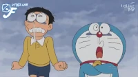 Doraemon và Nobita đang "cuộn" nhau trong lò sưởi Kotatsu.