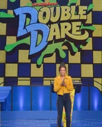 Liza poses in front of the podium