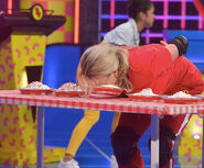 Spears competing in the 'Pie Carry' toss-up challenge