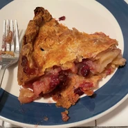 slice of Mitch's Apple Cranberry Pie