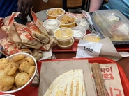 Six-Pack and a Pound, Super Nachos, Four Cheese Quesadilla, Churro