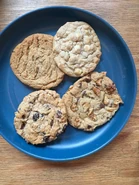 Peanut Butter, White Chocolate Macademia, Semi-Sweet Chocolate with Walnuts, Oatmeal Raisin Walnut