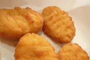 Chicken Nuggets with Creamed Corn and Baked Fries