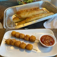 Extra Breadsticks and Fried Mozzarella Skewers