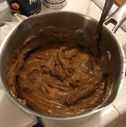 Gingerbread Cookies Process #2: "This is the mixture after adding an egg, flour, and the other dry ingredients"