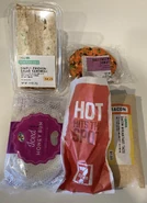 Simply Chicken Salad Sandwich, Halloween Donut, Iced Honey Bun, Beef & Bean Chimichanga, Bacon Breakfast Taco