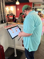 The Spoonman ordering at Tasty Burger