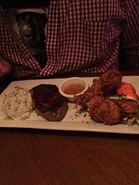 Steak with Coconut Lobster and Garlic Mashed Potatoes