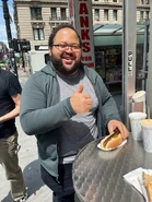 Grayspapayapic2.jpeg (230 KB) Zach and his pocket dog at Gray's