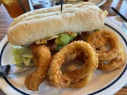 Knuckle's Chicken Sandwich and Golden Onion Rings