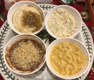 Mashed Potatoes w/ Gravy, Coleslaw, Red Beans and Rice, and Mac and Cheese