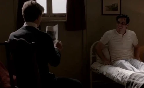 Jimmy reading a newspaper to Thomas.