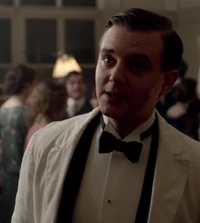 Waiter at Michael Gregson's party.