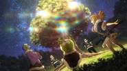 Suika looking at the Christmas tree in Season 2's "Sangenshoku" opening.