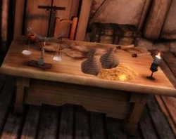 Area-Tevinter Hospice2.jpg (13 KB) Desk containing a note and key