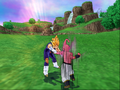 Kid Buu moves behind Vegeta in Budokai Tenkaichi 3