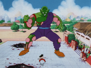 Great Namekian Piccolo towers over Goku