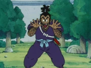 Murasaki taunts Goku from across the pond filled with piranhas