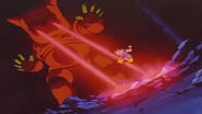 Luud al terzo stadio attacca Goku con la tecnica degli Occhi Laser.