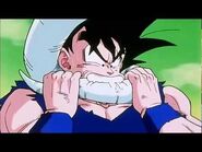 Goku bites Frieza's tail