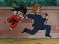 The announcer taking Goku for his match against Giran